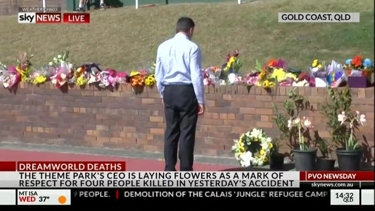 Dreamworld CEO lays wreath to pay respect to victims