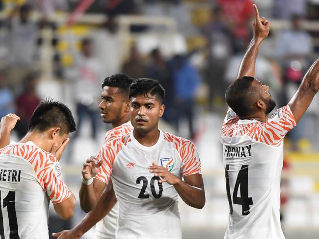 India's forward Sunil Chhetri (2nd-L) celebrates after scoring a goal during the 2019 AFC Asian Cup.