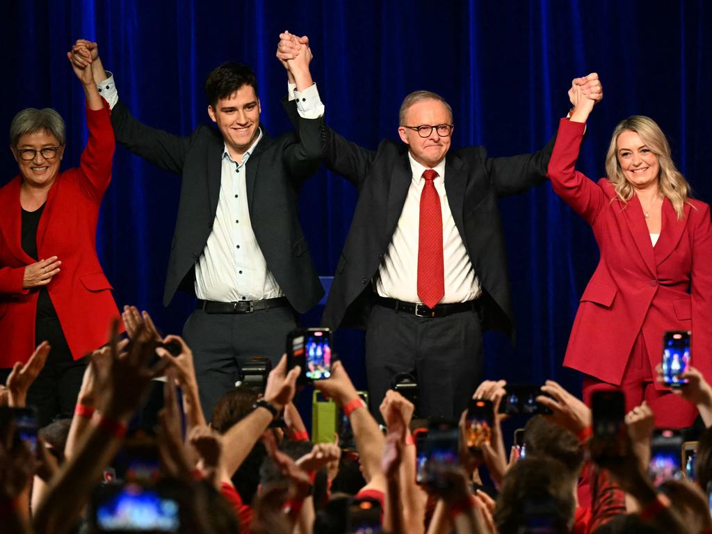 Anthony Albanese celebrates his win with partner Jodie Haydon, son Nathan and Australia's Foreign Minister Penny Wong. Picture: Saeed Khan