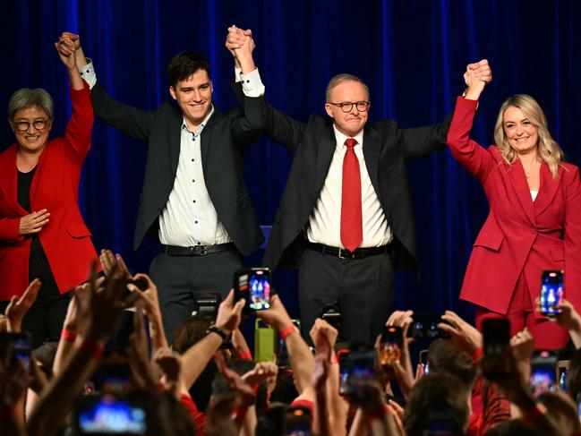 Anthony Albanese celebrates his win with partner Jodie Haydon, son Nathan and Australia's Foreign Minister Penny Wong. Picture: Saeed Khan