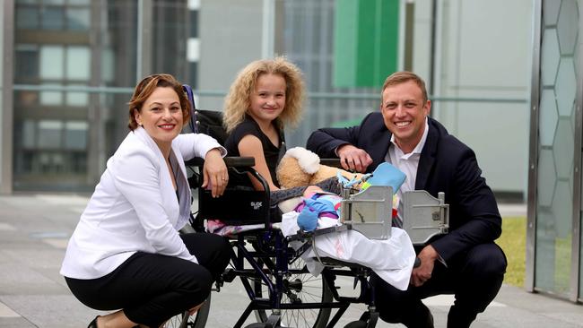 Deputy Premier Jackie Trad and Health Minister Steven Miles with Millie (Ameliana) Jolly at Lady Cilento Children's Hospital. Pic Bruce Long