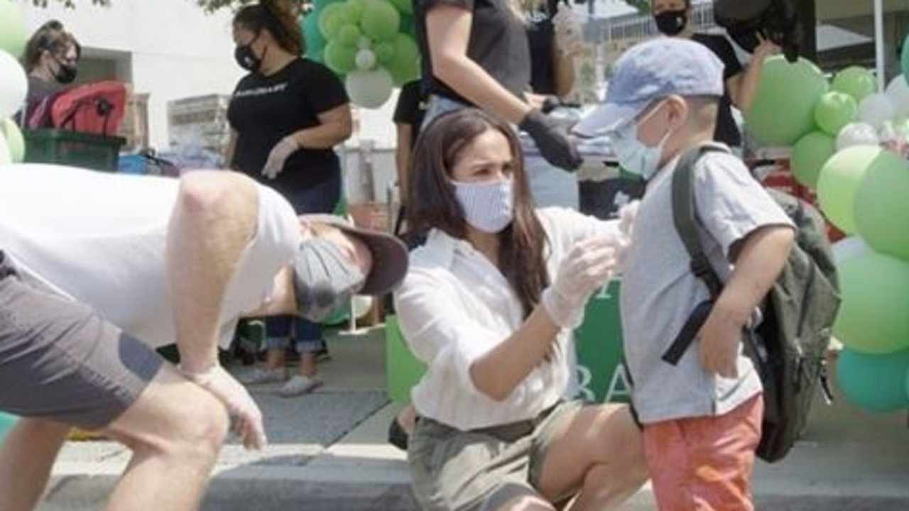 Meghan Markle and Prince Harry volunteering at a school charity drive in Los Angeles last week. Picture: Instagram