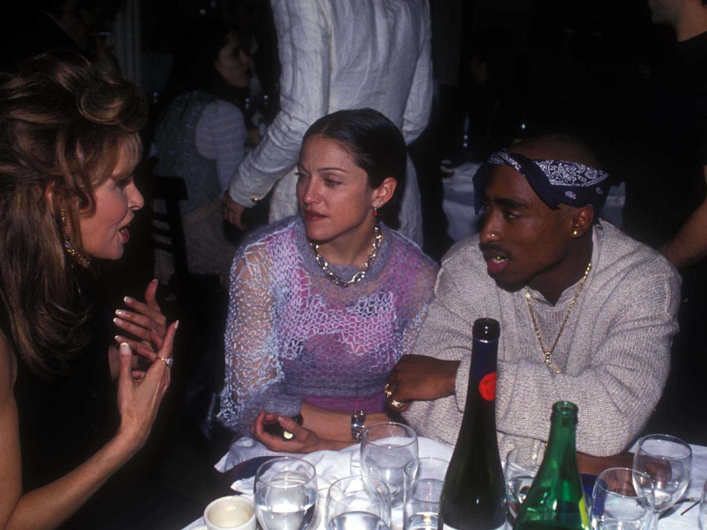 Tupac Shakur with Madonna, who he dated, and Racquel Welch in 1994. Picture: Getty Images