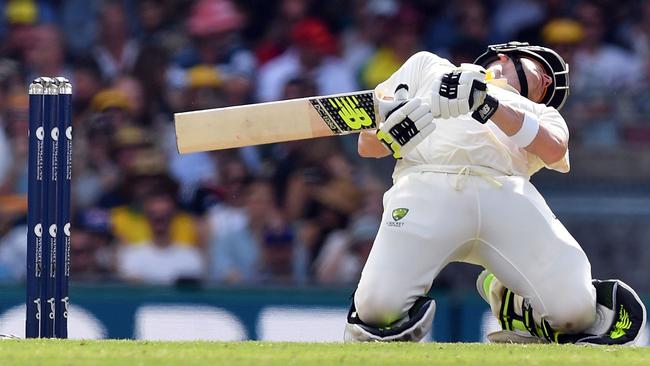 Steve Smith avoids another England bouncer.