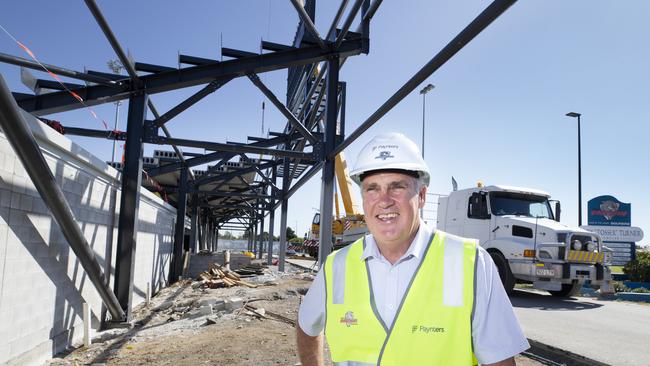 Stage 3 of Redcliffe Dolphins stadium is almost complete. Dolphins CEO Tony Murphy poses for a photograph with the new Northern stand being constructed in the background. Picture: Renae Droop