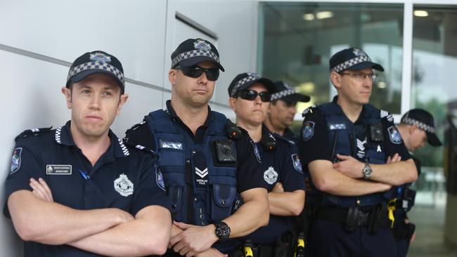 Police wearing their full uniform — on patrol outside the council chambers. Picture: Glenn Hampson.