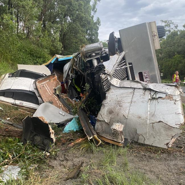 The wreckage of the B-double truck which crashed on the M1 at Gaven early on Thursday morning. Picture: Supplied