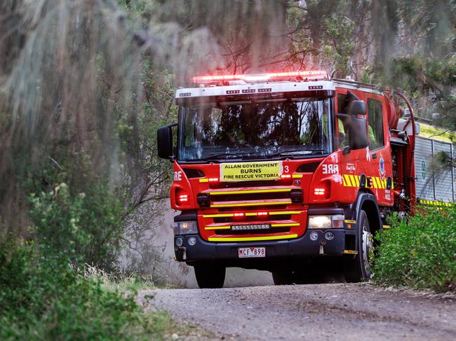 Fire crews responding to the grass fire near the West Gate Bridge. Picture: Aaron Francis