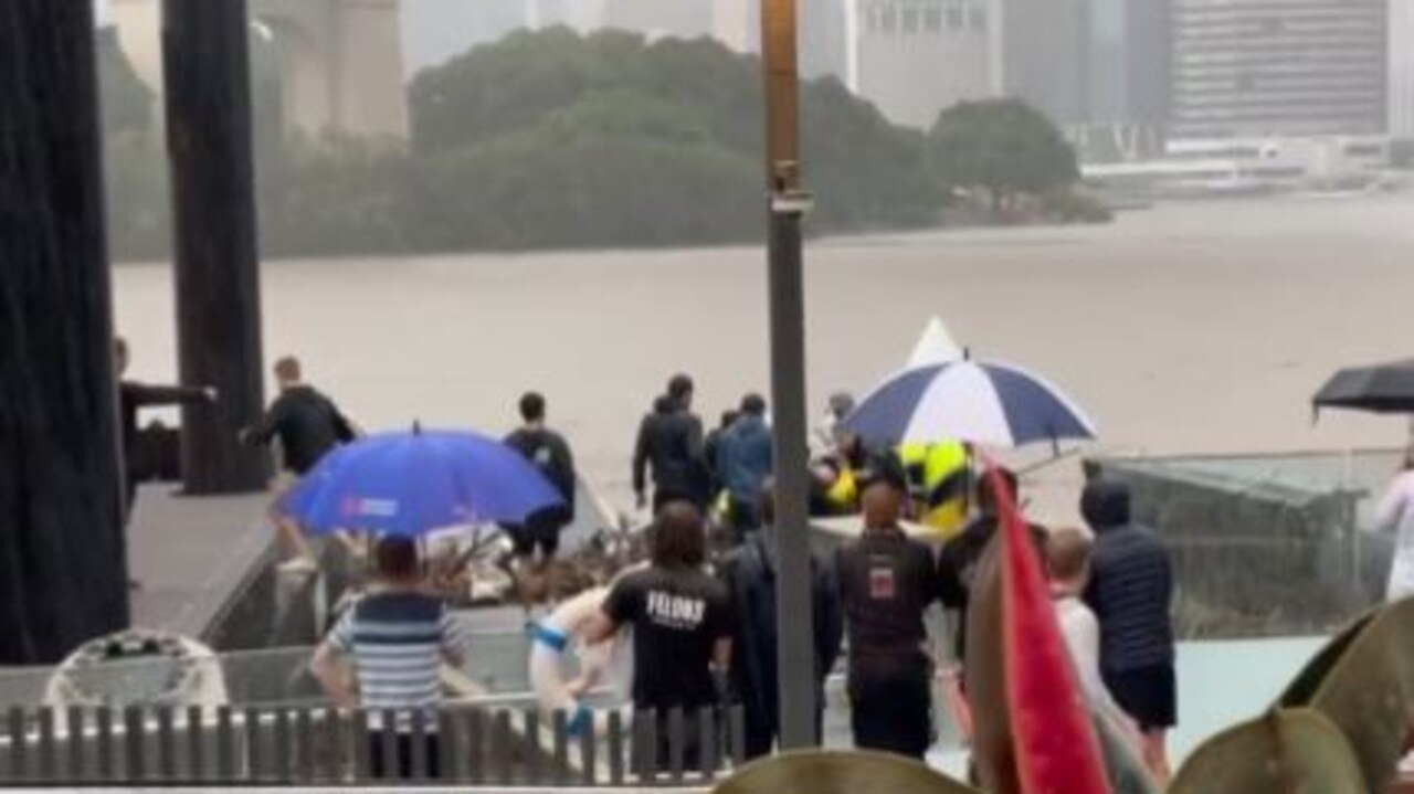 An incredible rescue of a man stuck under a pontoon at the Howard Smith Wharves ferry stop. Picture: Matthew Toomey/Twitter