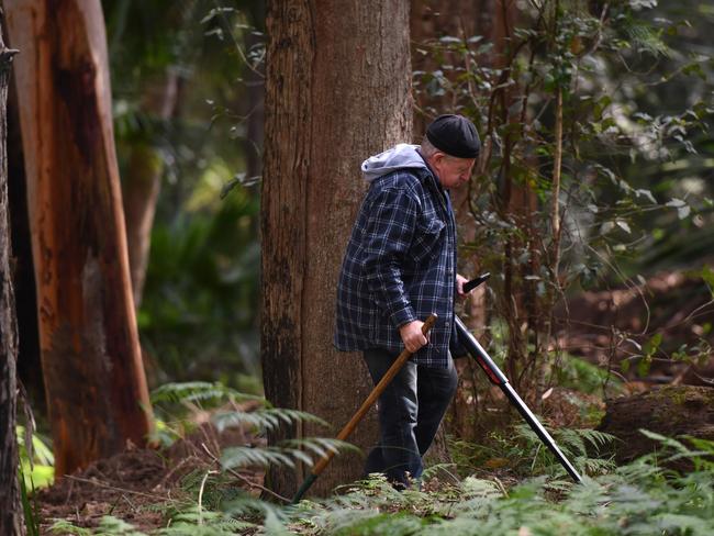 Mark Leveson, the father of Matthew Leveson, uses a metal detector searching for his son’s body. Picture: Dean Lewins