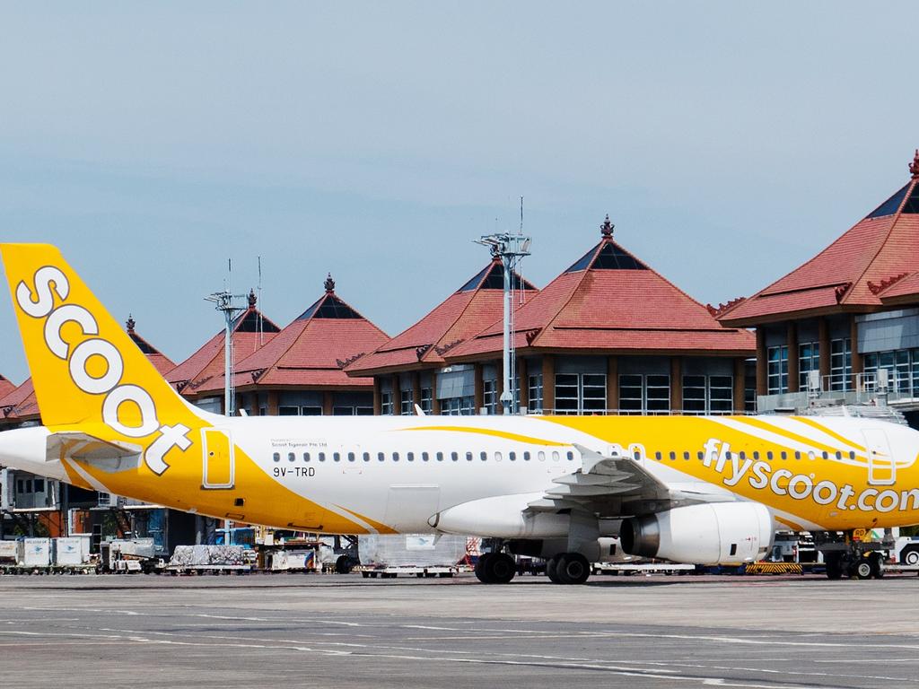 ESCAPE: Bali, Indonesia - December 26, 2017: Scoot Airbus A320 park at Denpasar Ngurah Rai International Airport. Picture: Istock