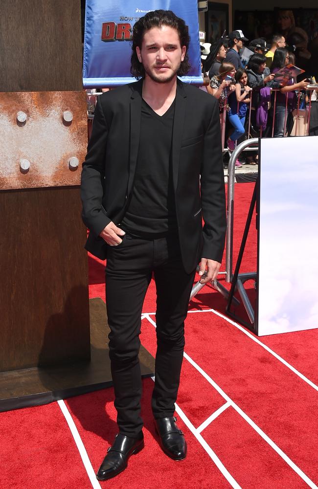 The actor arrives at the LA premiere of How To Train Your Dragon 2. Harington is the voice of Eret the Dragonknapper in the movie.