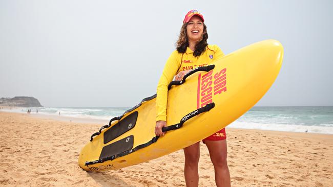 ‘I didn’t want to go to Canada — it was too cold’: Englishwoman Amy Nosike at Newcastle’s Merewether Beach has embraced the Aussie lifestyle. Picture: Adam Yip