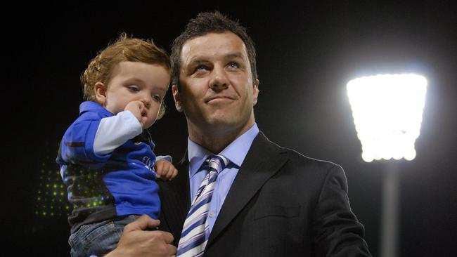 Former Force player Brendan Cannon with his son Joseph in Perth in 2007.