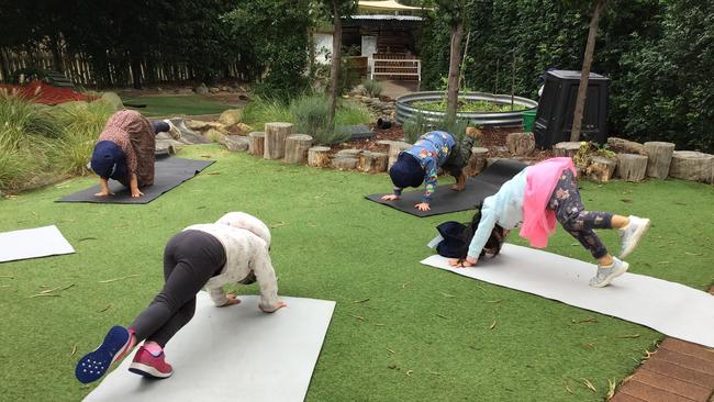 Lane Cove kids de-stress with a touch of outdoor yoga. Picture: Supplied