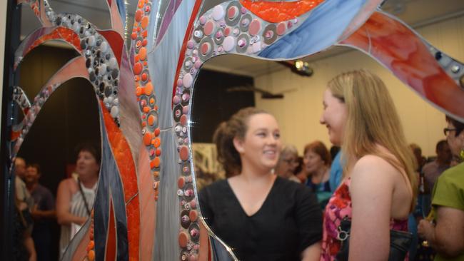 ARTISTIC MINDS: The artistic community of Miles gathered at Kylie Bourne's exhibition 'TRE360' at the Dogwood Crossing art gallery. Pic: Kate McCormack