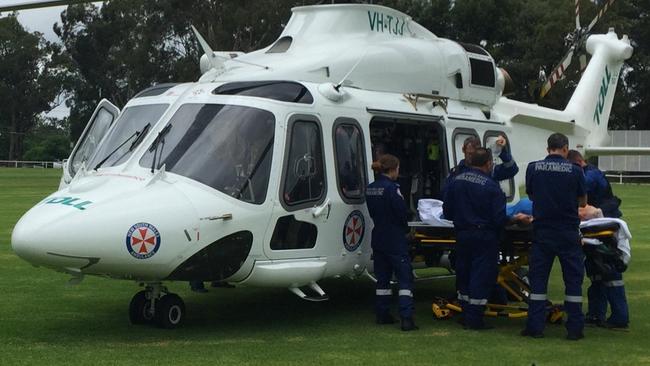 CareFlight’s rapid response rescue chopper responded shortly before 10.30am, landing in the neighbouring suburb of Springwood due to weather conditions. Picture: CareFlight