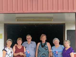 COUNTRY FANS: Elaine Pedersen, Leonne and Neville Johnson, Debra Polzin, Nell Healy and Dawn Anderson didn't let a little darkness get in the way of their love for country music. Picture: Jann Houley