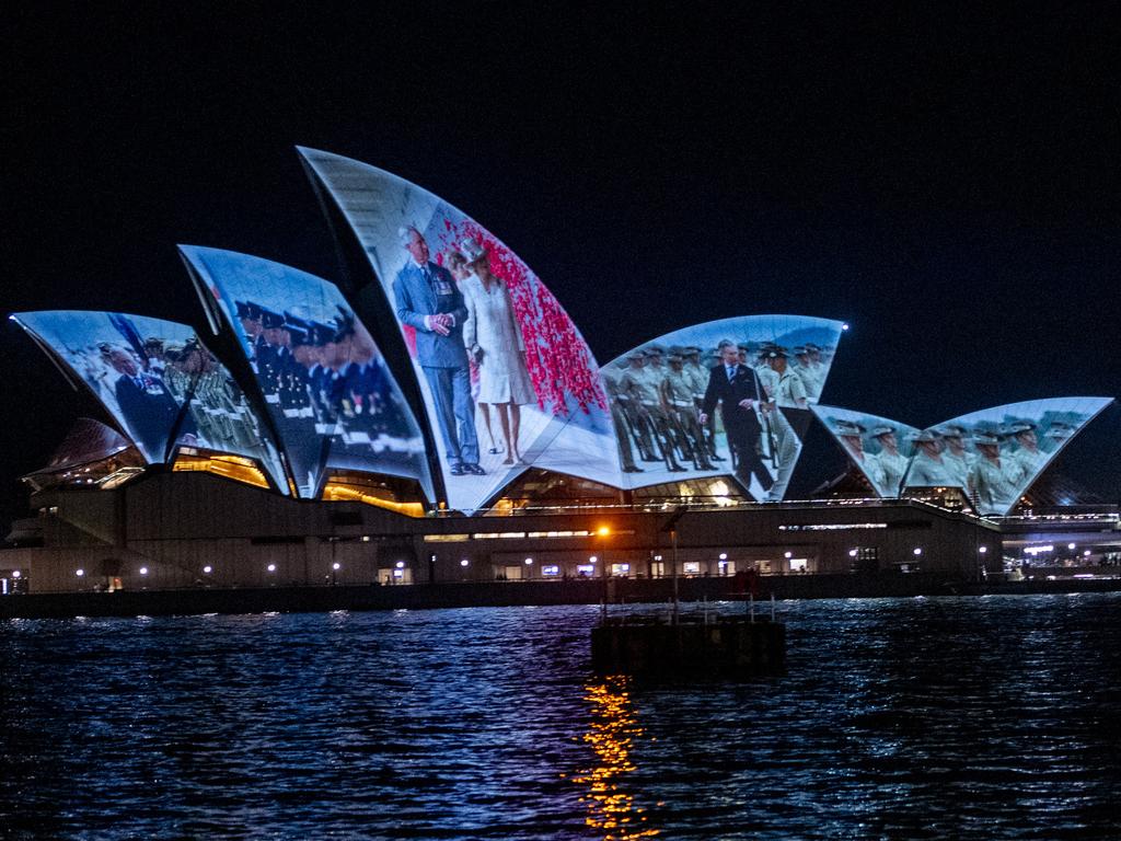 The Sydney Opera House sails displayed images of the reigning British monarchs as they arrived in Sydney to begin their brief tour. Picture: NewsWire/Jeremy Piper