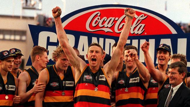 Footballer Shaun Rehn (c) celebrating after the Adelaide Crows defeated North Melbourne in the 1998 AFL Grand Final.