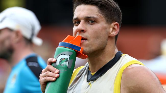 Dion Prestia rehydrates during the Richmond intra-club match. Picture: Mark Dadswell