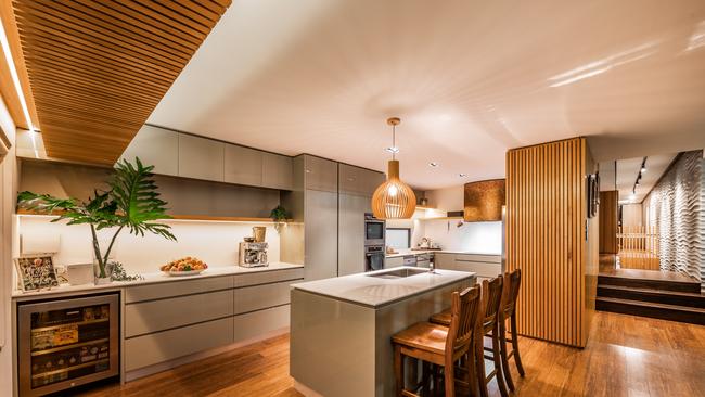 The kitchen includes four ovens, two dishwashers and two sinks.