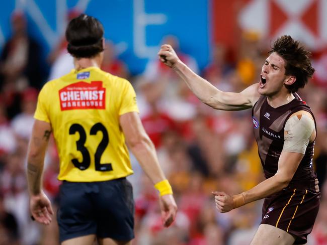 Will Day celebrates one of his three first-half goals.