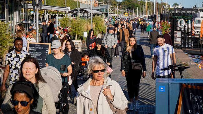 People walk on Stranvagen in Stockholm. Picture; AFP.