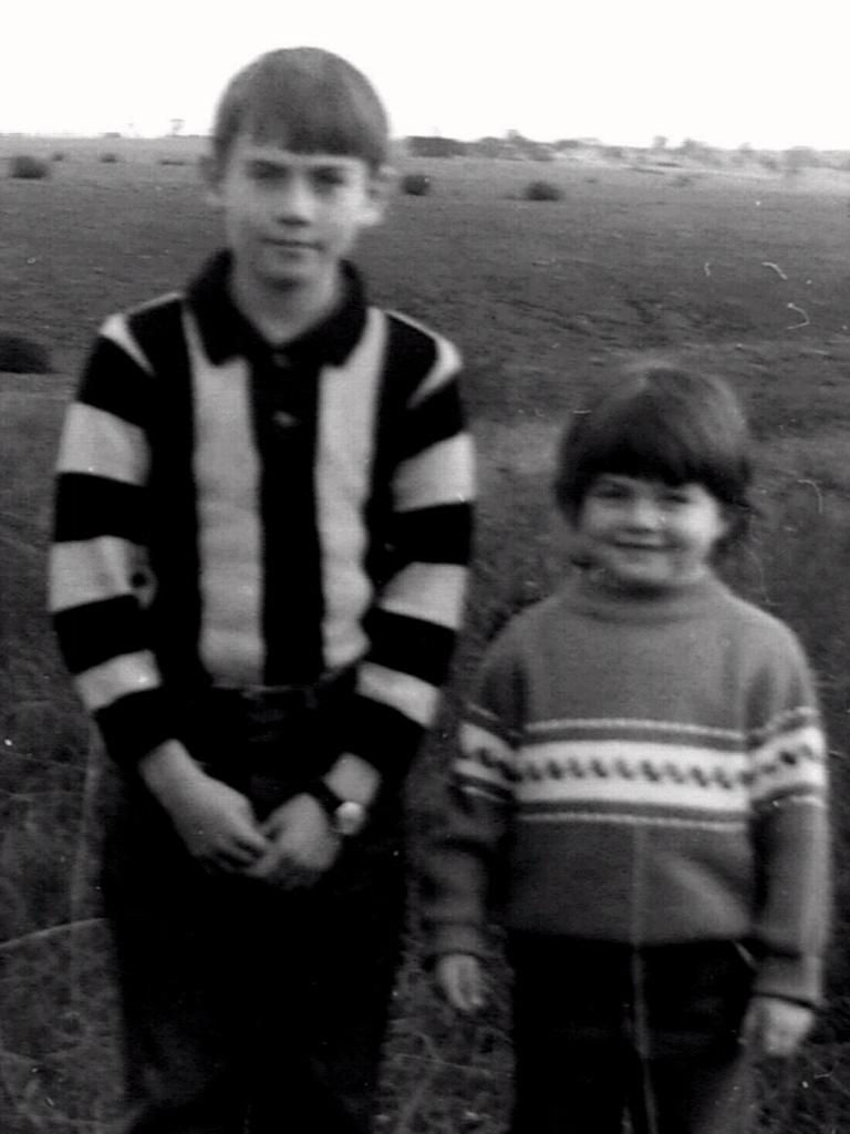 A young Eddie McGuire with sister Brigette in the paddocks at Broadmeadows.