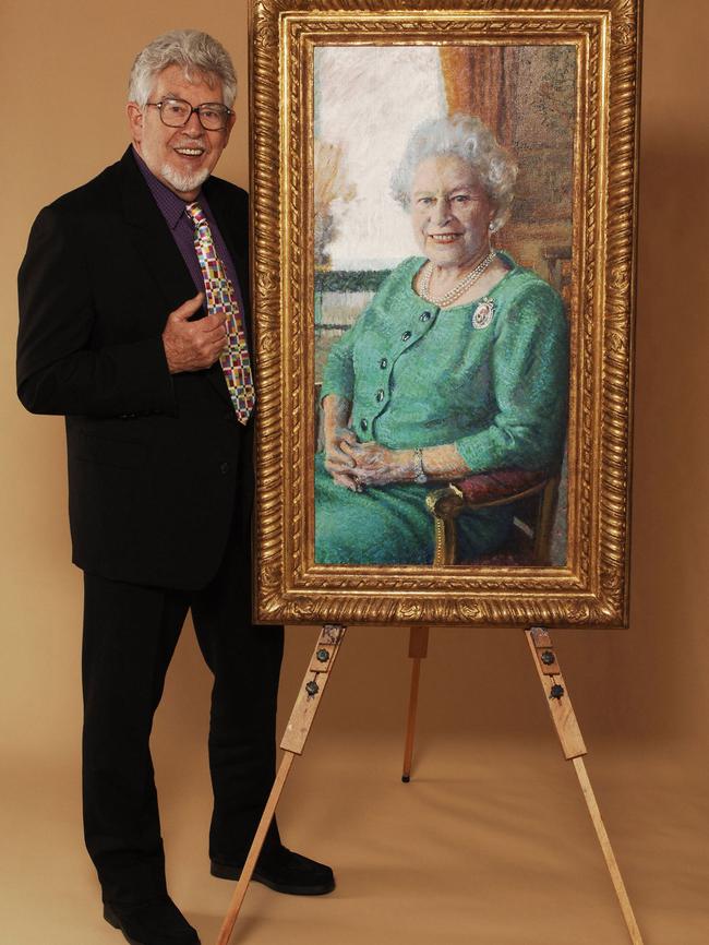 Harris with his portrait of Queen Elizabeth. The location of the painting is unknown