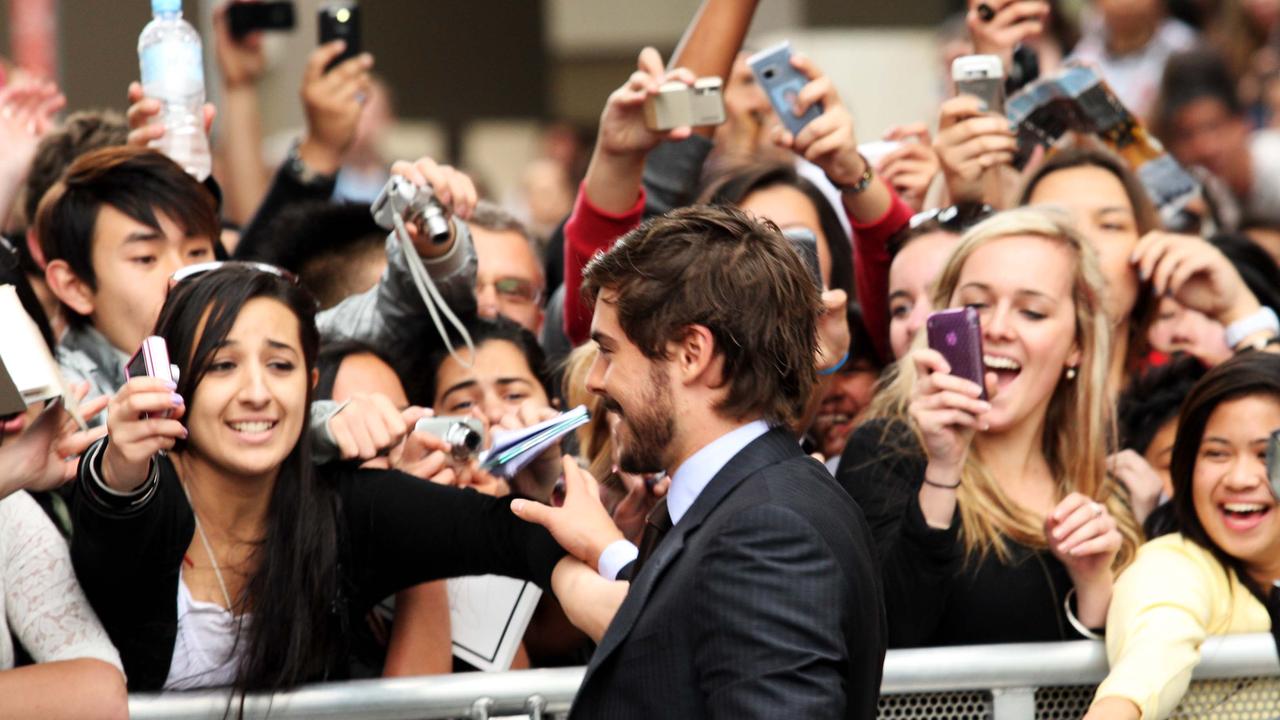 Actor Zac Efron at Westfield Parramatta spruiking his new film Charlie St Cloud in 2010. Notice the cameras before the proliferation of cameras in mobile phone.