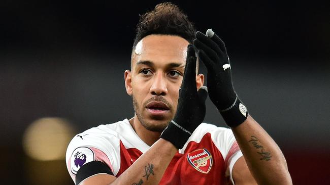 Arsenal's Gabonese striker Pierre-Emerick Aubameyang applauds the fans following the English Premier League football match between Arsenal and Fulham at the Emirates Stadium in London on January 1, 2019. - Arsenal won the match 4-1. (Photo by Glyn KIRK / AFP) / RESTRICTED TO EDITORIAL USE. No use with unauthorized audio, video, data, fixture lists, club/league logos or 'live' services. Online in-match use limited to 120 images. An additional 40 images may be used in extra time. No video emulation. Social media in-match use limited to 120 images. An additional 40 images may be used in extra time. No use in betting publications, games or single club/league/player publications. /