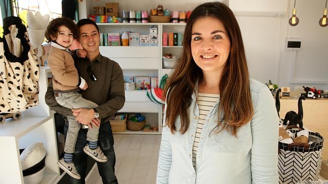 Penny Thoms, with husband David and son William inside her store In My Hood, is the average Hills resident