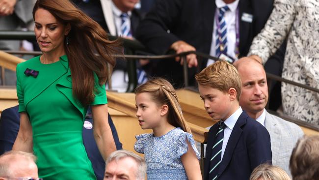 The family enter the royal box.