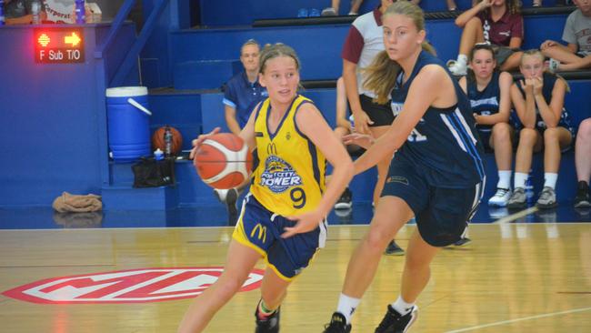 Gladstone’s Jordan Porter breaks past Rockhampton defence. PHOTO: Nick Kossatch