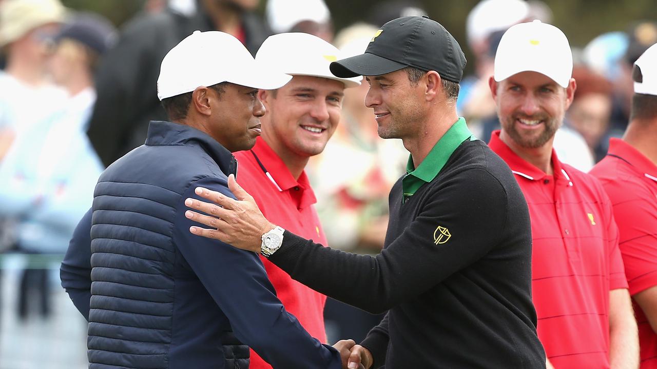 Tiger Woods and Adam Scott are linking up again. Picture: AAP / Rob Prezioso