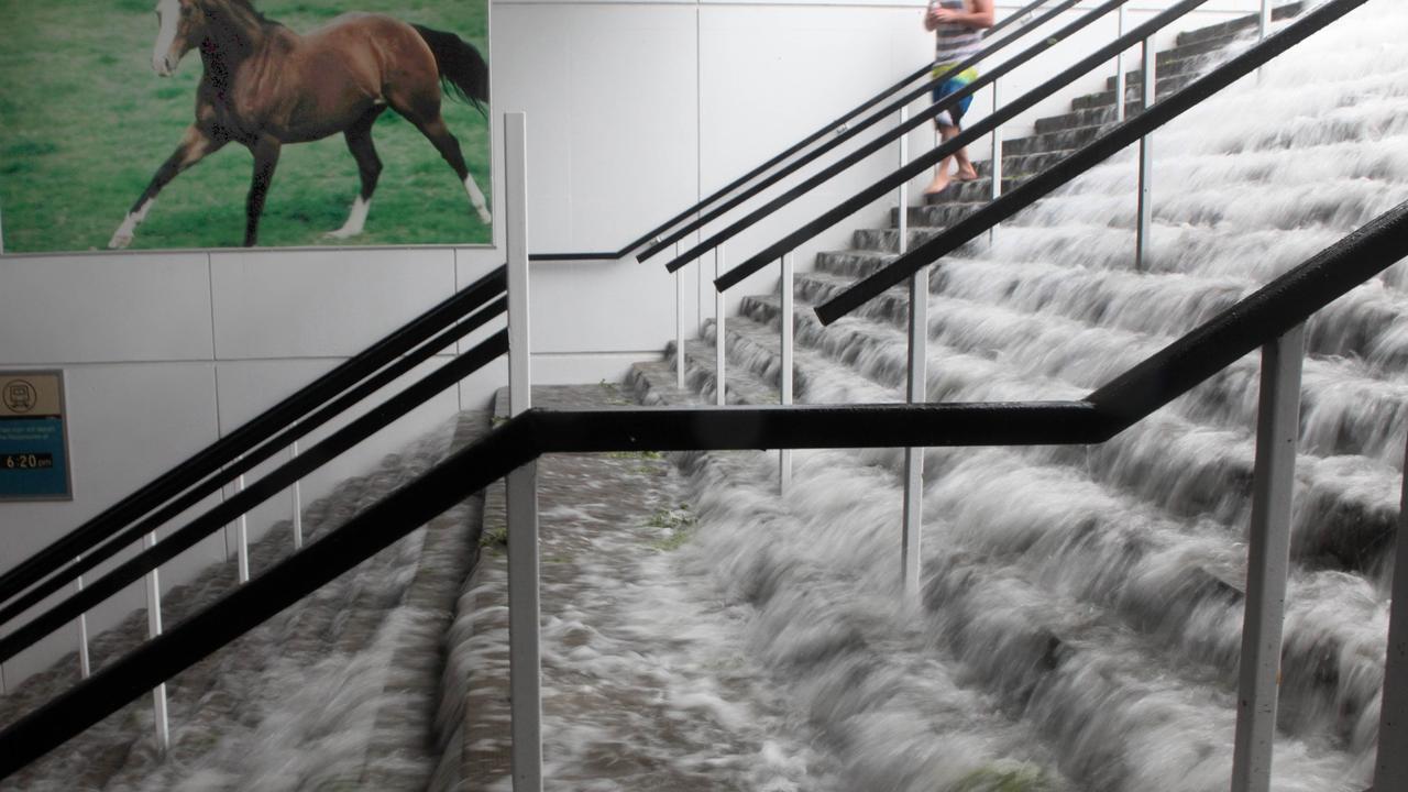 Stairs turned into waterfalls. Picture: AAP