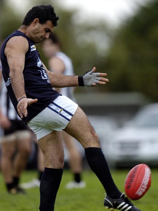 George Gorozidis takes a kick for Berwick in 2008.