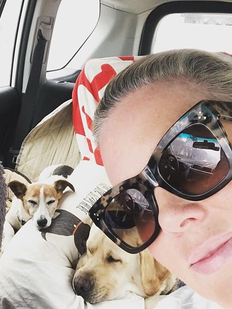 Armytage with her dogs. Picture: Instagram/@sam_armytage