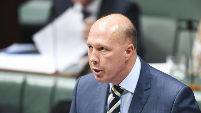 Australian Home Affairs Minister Peter Dutton speaks during House of Representatives Question Time at Parliament House in Canberra, Thursday, April 4, 2019.(AAP Image/Lukas Coch) NO ARCHIVING