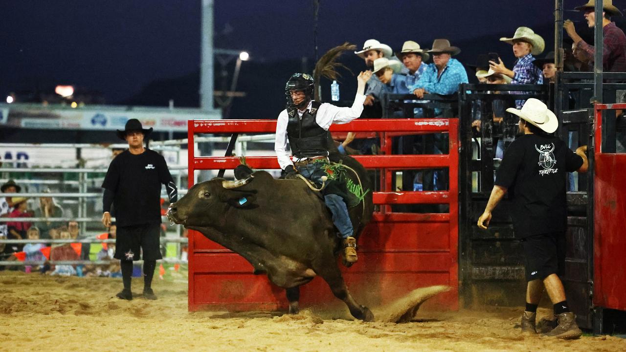 Corey Mitchell competes in the novice bull ride at the 2024 Cairns Bull Throttle event, a bikes and bulls show, featuring bull riding and freestyle motocross riders at the Cairns Showgrounds. Picture: Brendan Radke