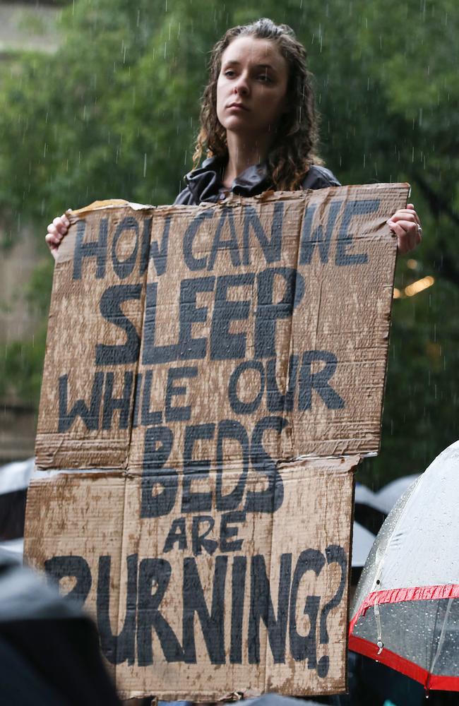 Rain didn’t deter protesters. Picture : Ian Currie