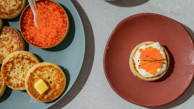 Crumpets with creme fraiche and salmon roe. Photo: Nikki To / TWAM