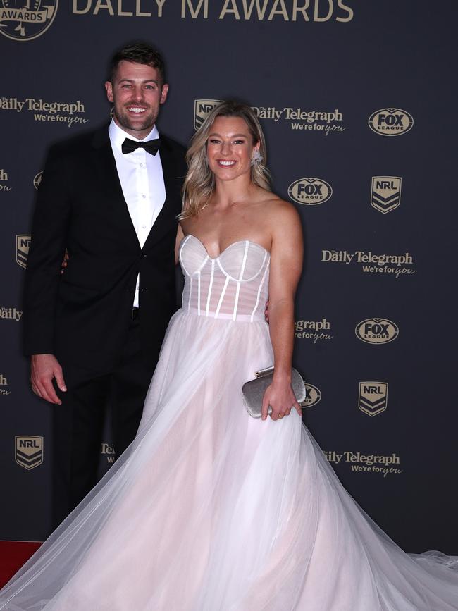 Emma Tonegato of the Dragons and her partner arrive. Picture: Jason McCawley/Getty Images