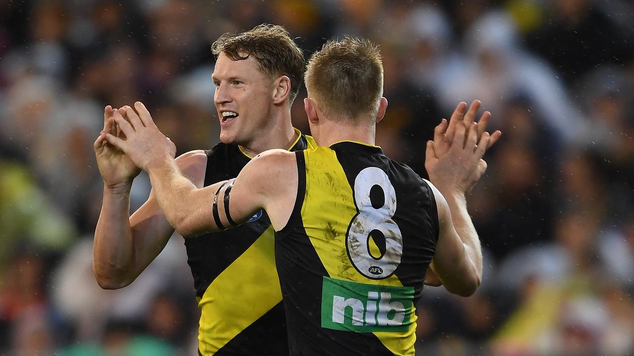 Josh Caddy and Jack Riewoldt at the MCG last Thursday night.