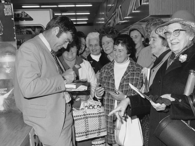 Neil Kerley autographs his record at Cox Foys.