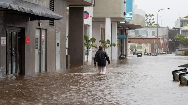 Byron Bay was hit harder in the second sudden flood than the first, with shocking images showing the main street inundated. Picture: NCA NewsWire / Danielle Smith