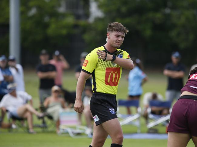 The referee calls a forward pass. Picture Warren Gannon Photography