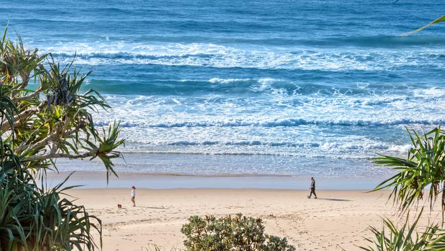 Paramedics have rushed to Sunshine Beach in the Noosa Shire after a man was pulled from the water.