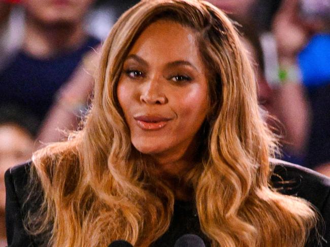 TOPSHOT - US singer-songwriter Beyonce speaks during a campaign rally for US Vice President and Democratic presidential candidate Kamala Harris at Shell Energy Stadium in Houston, Texas, on October 25, 2024. (Photo by Miguel J. Rodriguez CARRILLO / AFP)